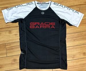 Official Gracie Barra short-sleeve Ranked Rash Guard. Unisex, Size Medium